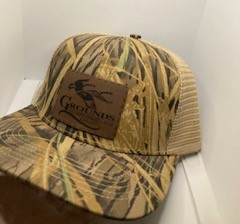 Bottomland, tan mesh back, slightly curved bill